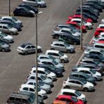 cars parked on parking lot during daytime